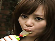 Magnetizing Japanese Model Akiko Seo Is Licking Candy Seductively