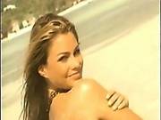 Sofia Vergara Removes Her Bikini Top Before Standing