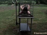 Juliette March Is Outside In The Cage Getting Sprayed With Cold Water