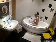 A Hidden Cam Video Tapes How Lisa Is Taking Shower
