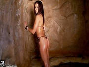 Ann Marie Posing In Front Rock And Touching Her Nipples