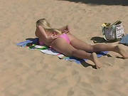 Solo Blonde In Bikini Loosens Her Melons While Sunbathing At The Beach