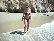 Alexis Adams Plays On The Beach In Her Bikini