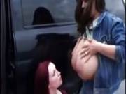 A Woman Sucks A Pair Of Lactating Breasts