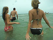 Two Alluring Students Swim In Ocean With A Brutal Dude