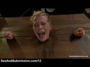 Blonde Immobilized In The Wall Stockade A 