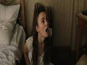 Keira Knightley Bent Over The Arm Of A Sofa With Her Top