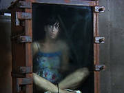 Brunette Elise Graves Is Locked Into A Small Glass Box