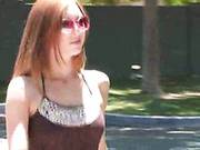 Lusty Redhead Leanne Walks Along The Street Then Lifts Her Mini Skirt Showing Her Slit