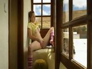 Blonde Teen Rubs Her Sweet Pinkpussy While Looking Through Window