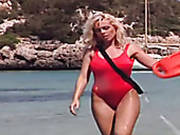Saucy Blond Haired Milf In Red Swim Suit Performs Steamy Solo On Sandy Beach
