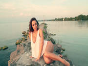 Busty Brunette Adrienn Levai Posing By The Water