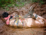 Naughty Girl Elise Graves Tied Up In The Mud