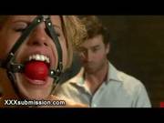 Chained Busty Babe Flogged And Shocked