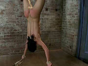 Her Head Is About To Pop Up, As She Is Hanged On Her Legs
